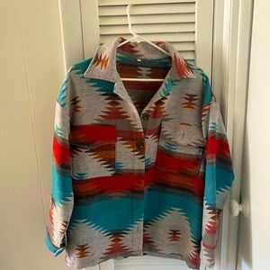 Aztec design jacket.